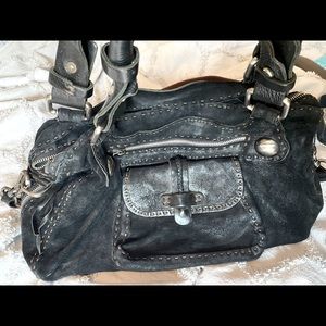 Beautiful leather suede black designer purse .